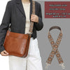 A brown leather shoulder bag with an adjustable textile strap is shown being worn by a person.