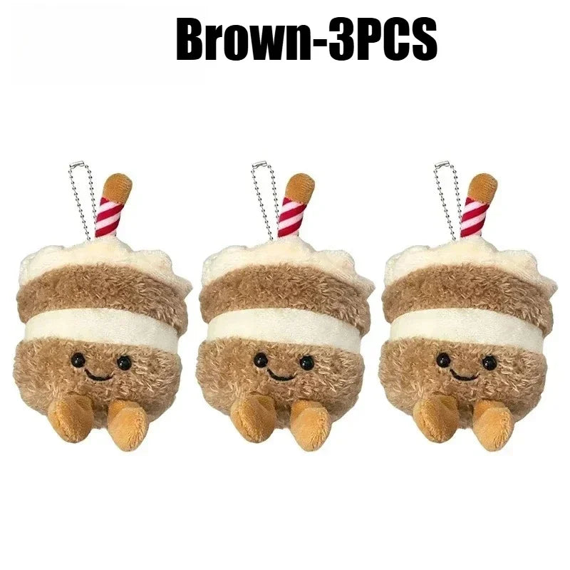 Three brown bread plush keychains with striped straws and gold chains
