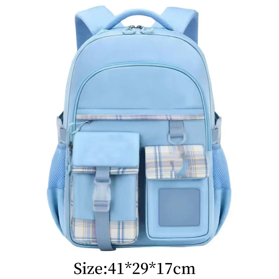 Light blue children's school backpack with a light plaid trim and mesh pockets