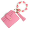 Pink silicone bead and leather card wallet with a white and pink beaded bracelet