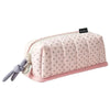 A pink pencil case with a dot pattern design and a gray drawstring closure.