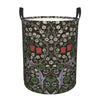A dark floral patterned laundry hamper with black handles.