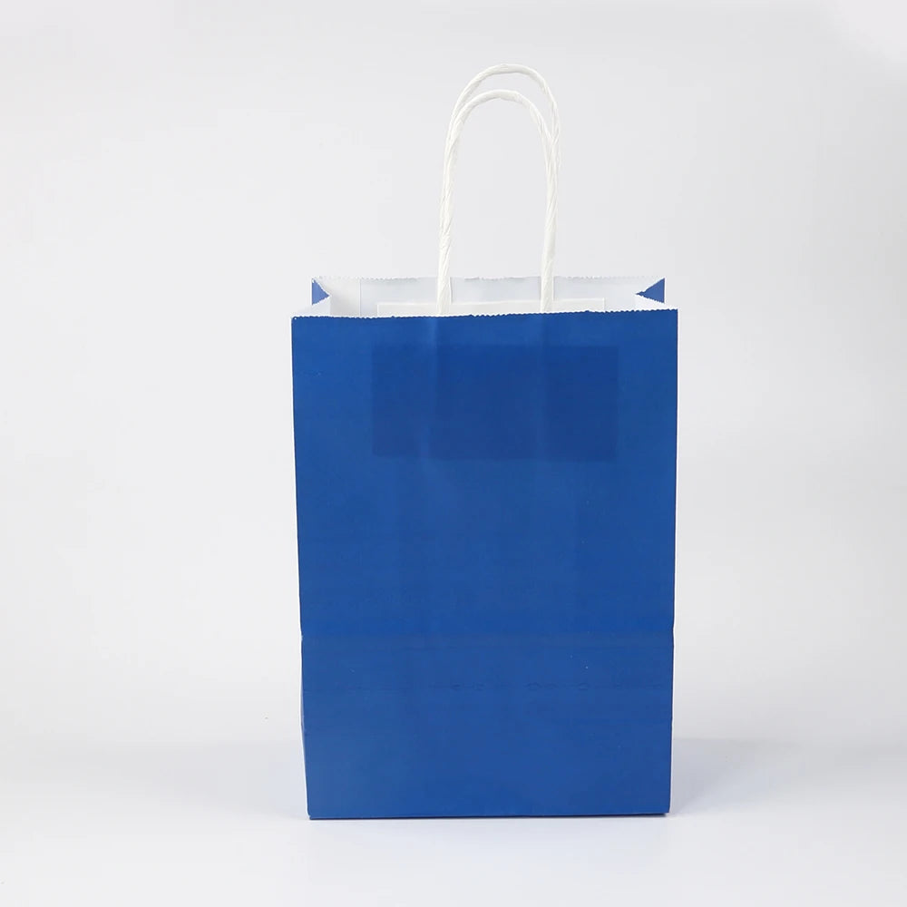 A vertical blue reusable kraft paper gift bag with white string handles.