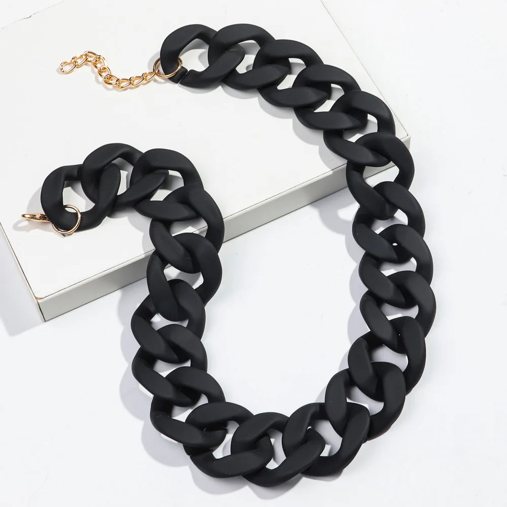 Black matte acrylic chain choker necklace with a gold-colored clasp