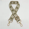 A beige and olive green patterned replacement bag strap with adjustable metal clasps.