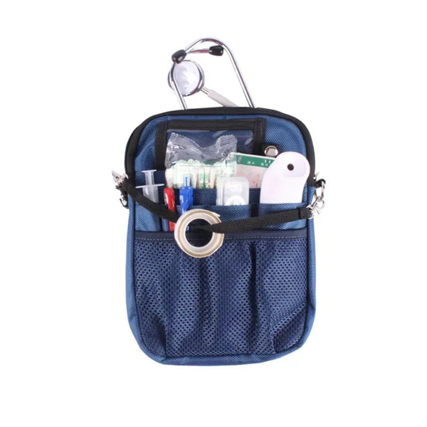 A dark blue adjustable nurse fanny pack containing various medical tools and a light-colored pen.