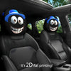 Two black headrest covers with blue hats are shown installed in a car seat interior.