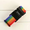 Black luggage security strap with multicolored woven fabric straps.