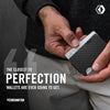 A hand is holding a black slim RFID blocking wallet against a dark background.