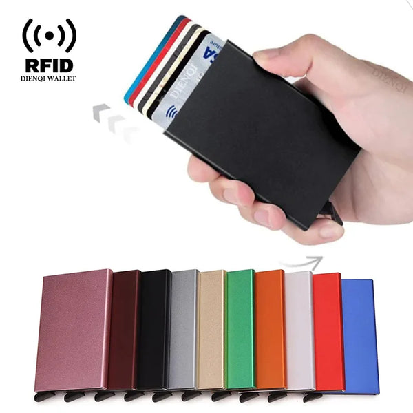 A hand holds a black slim RFID credit card and ID wallet with various colored cards displayed below.