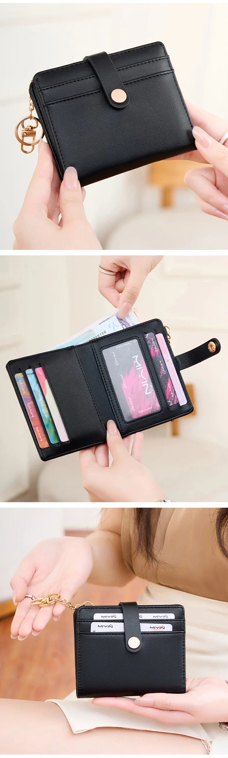 A black minimalist wallet with a gold charm is shown being held by hands, displaying various cards and IDs.