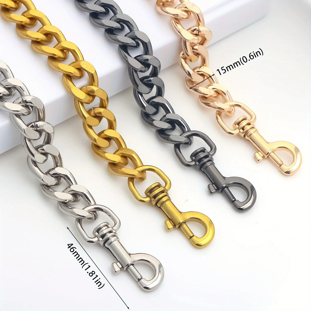 A collection of thick metal purse chain replacement straps in gold, silver, and black, shown laid out on a white surface.