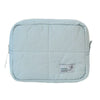 Light blue aesthetic quilted puffer makeup bag with a small logo tag
