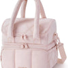 A light pink quilted insulated lunch bag with carrying handles and zippered compartments.