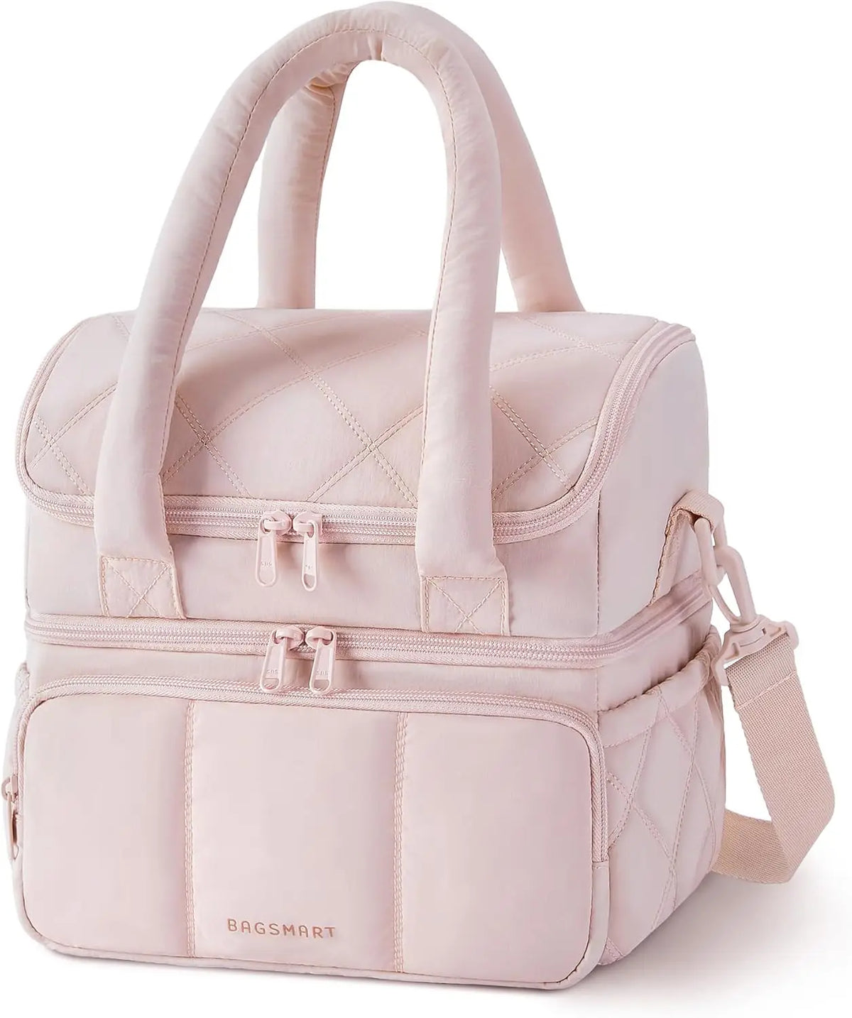 A light pink quilted insulated lunch bag with carrying handles and zippered compartments.