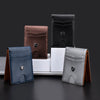 Three slim genuine leather wallets in navy blue, brown, and gray displayed on a dark surface.