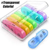 A clear weekly pill organizer with seven colorful compartments for daily medication