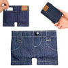 A dark blue denim mini wallet and card holder is shown being held and displayed.