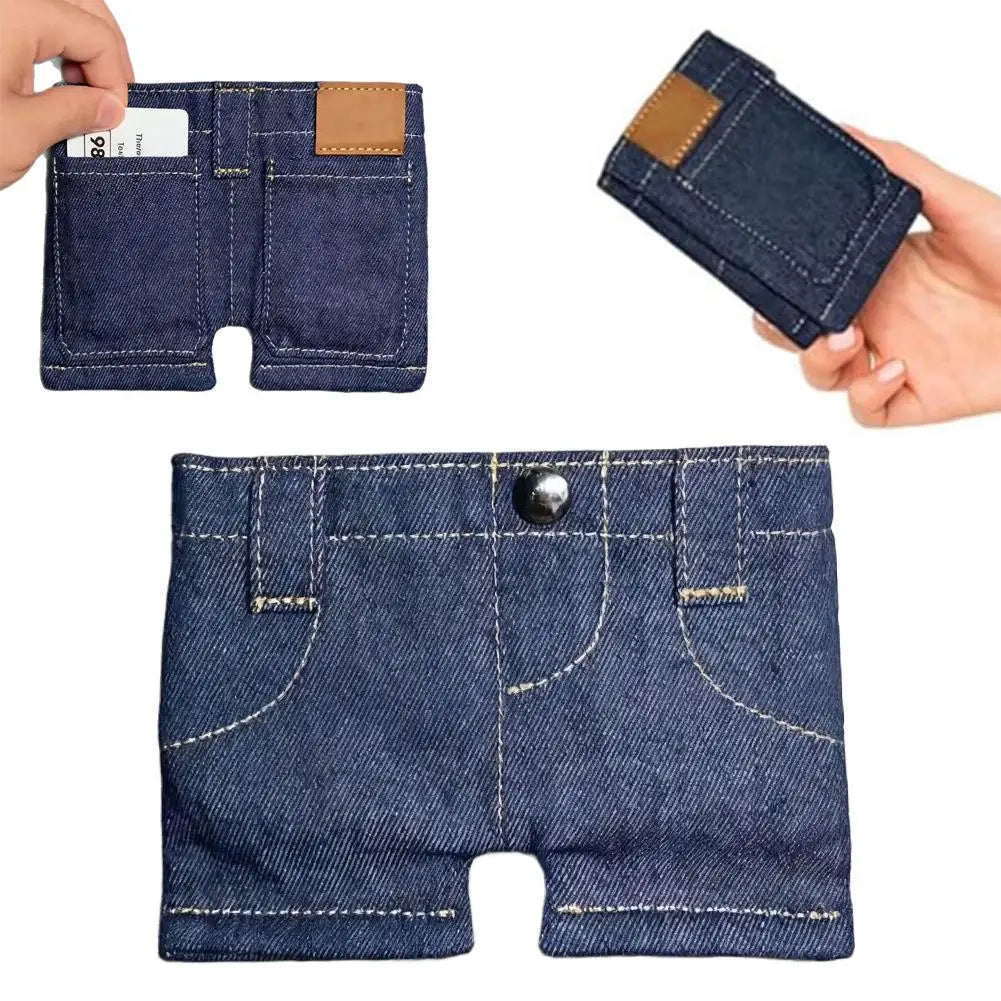 A dark blue denim mini wallet and card holder is shown being held and displayed.