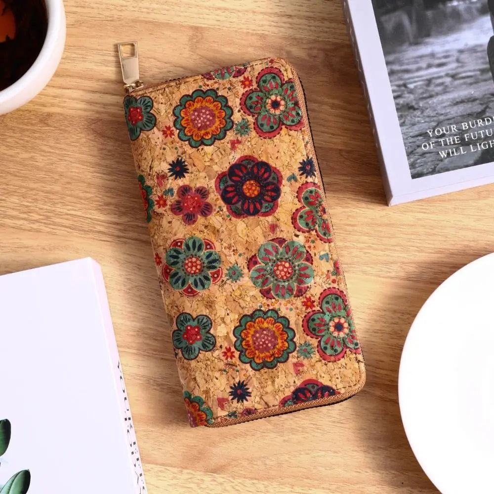 A patterned bohemian wood-grain leather wallet with multiple card slots resting on a light wooden surface.