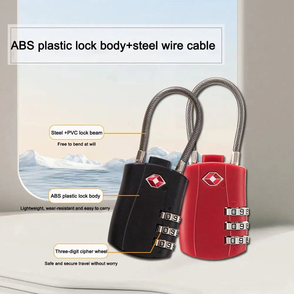A pair of red and black ABS plastic lock bodies with steel wire cables shown against a snowy background.