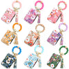 A collection of silicone bead PU leather key chain wallets featuring various floral patterns and colors.