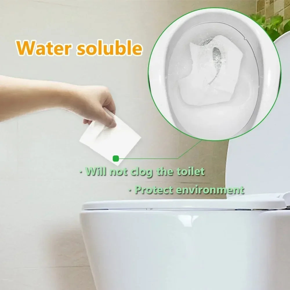 A hand places a white water soluble item into a toilet bowl, demonstrating that it will not clog the toilet and protects the 