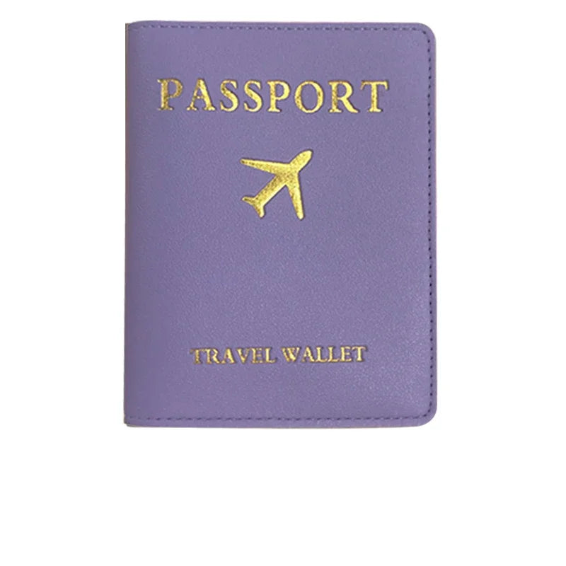 Purple PU leather passport holder with gold foil text and a gold airplane emblem.