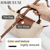 A hand holds a beige leather handbag with a brown strap, showing the restored color and texture.