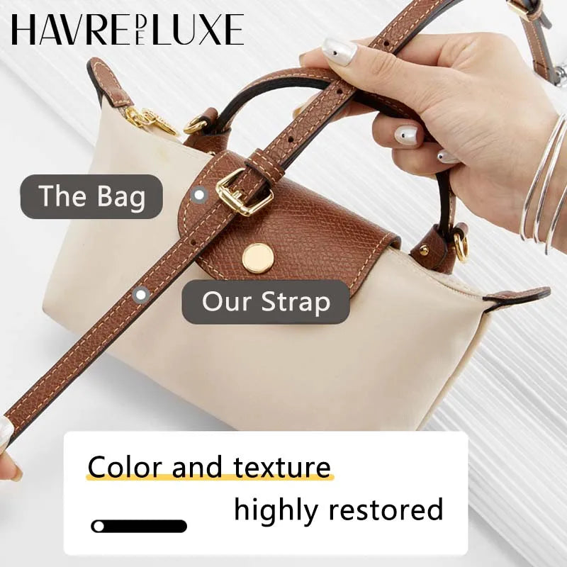 A hand holds a beige leather handbag with a brown strap, showing the restored color and texture.