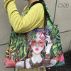 A tote bag featuring a colorful illustration of a woman wearing pink glasses and adorned with tropical foliage.