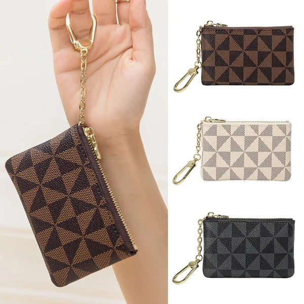 Three geometric mini coin purses in brown black beige and black leather with gold chains