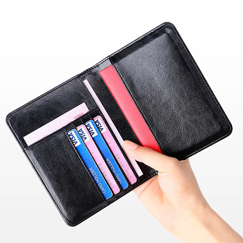 A black genuine leather RFID blocking passport holder displaying several colored cards.