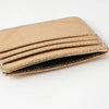 A tan leather mini wallet card holder with stitched edges shown open.