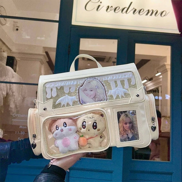 A light beige transparent PU crossbody bag with a clear window displaying small photos.