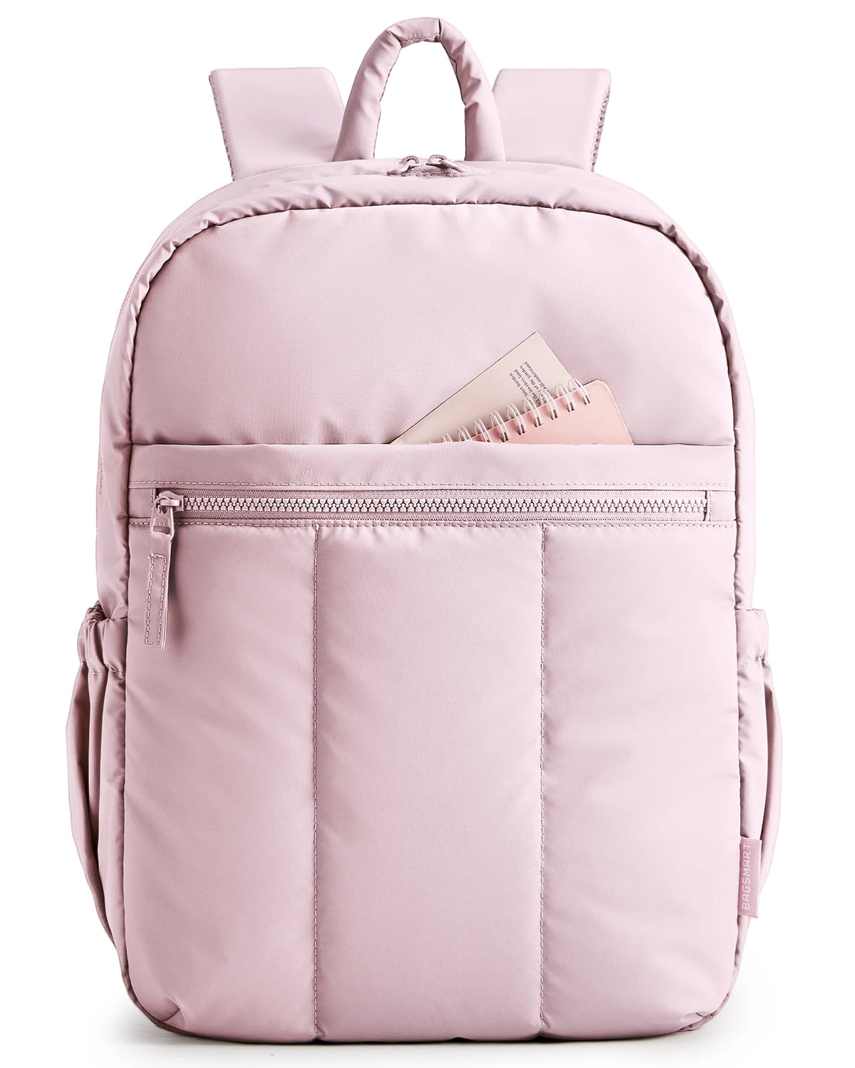 A light pink large capacity laptop backpack with quilted detailing and a zipper pocket.