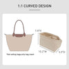 A light beige felt mini bag organizer pouch with a curved design and a handle.