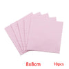 A stack of ten pink polishing cloths with serrated edges for jewelry cleaning.