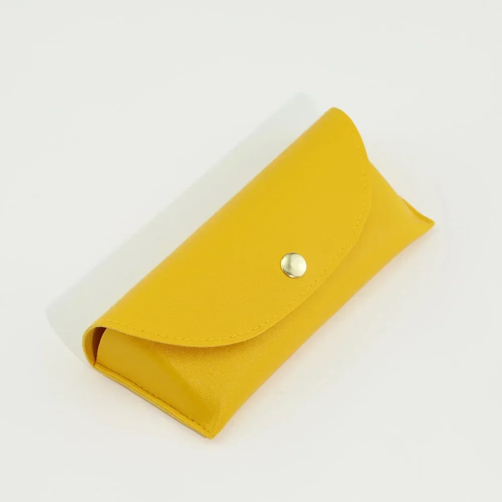A bright yellow PU leather hard shell sunglasses case shown from above.