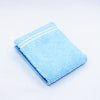 A folded light blue fabric wallet with embroidered details on a white background.