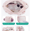 Pink large main compartment tote bag showing various internal and external pockets including pass-through, waterproof, and ea