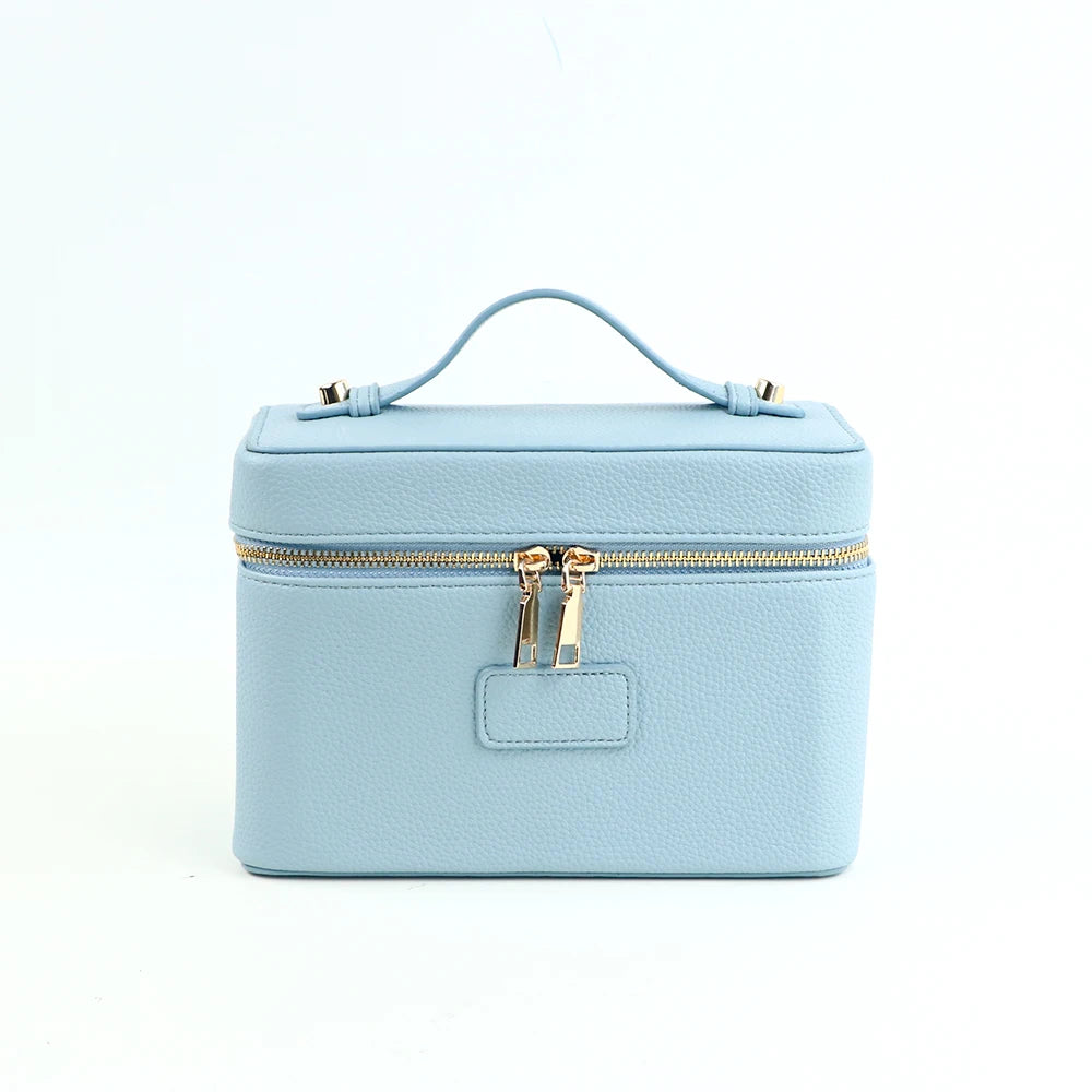 Light blue customizable PU leather makeup bag with a zipper and handle