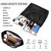 A large capacity black tote bag filled with various items including electronics, cosmetics, and accessories.