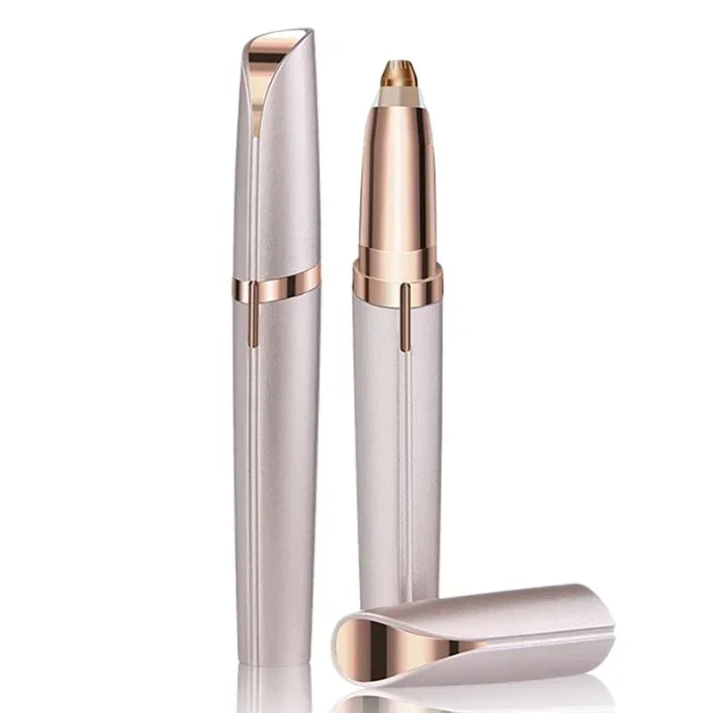 A sleek, rose gold electric eyebrow trimmer with a protective cap and a separate trimming head.