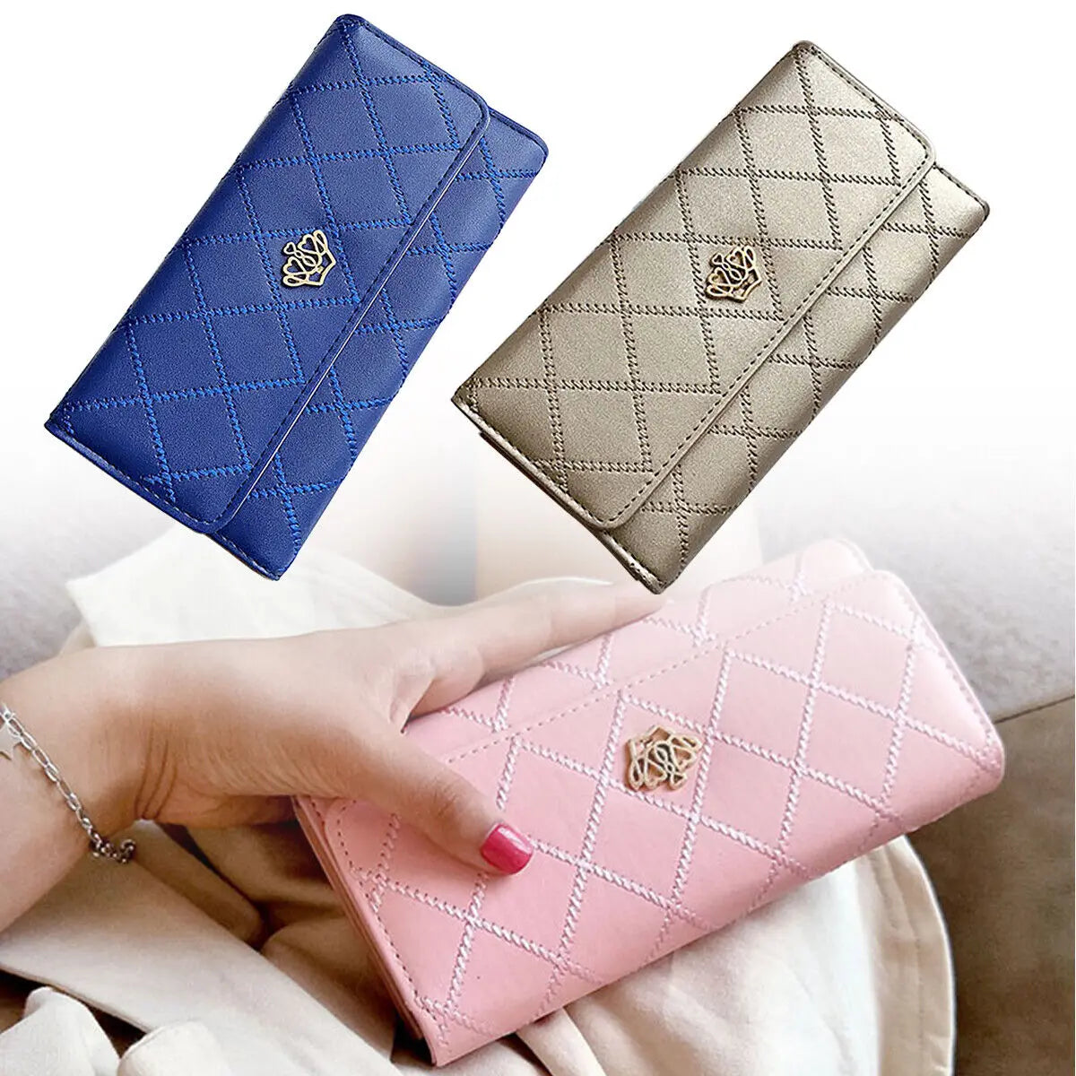 Three diamond quilted wallets in blue, gold, and pink are shown being held by a hand.