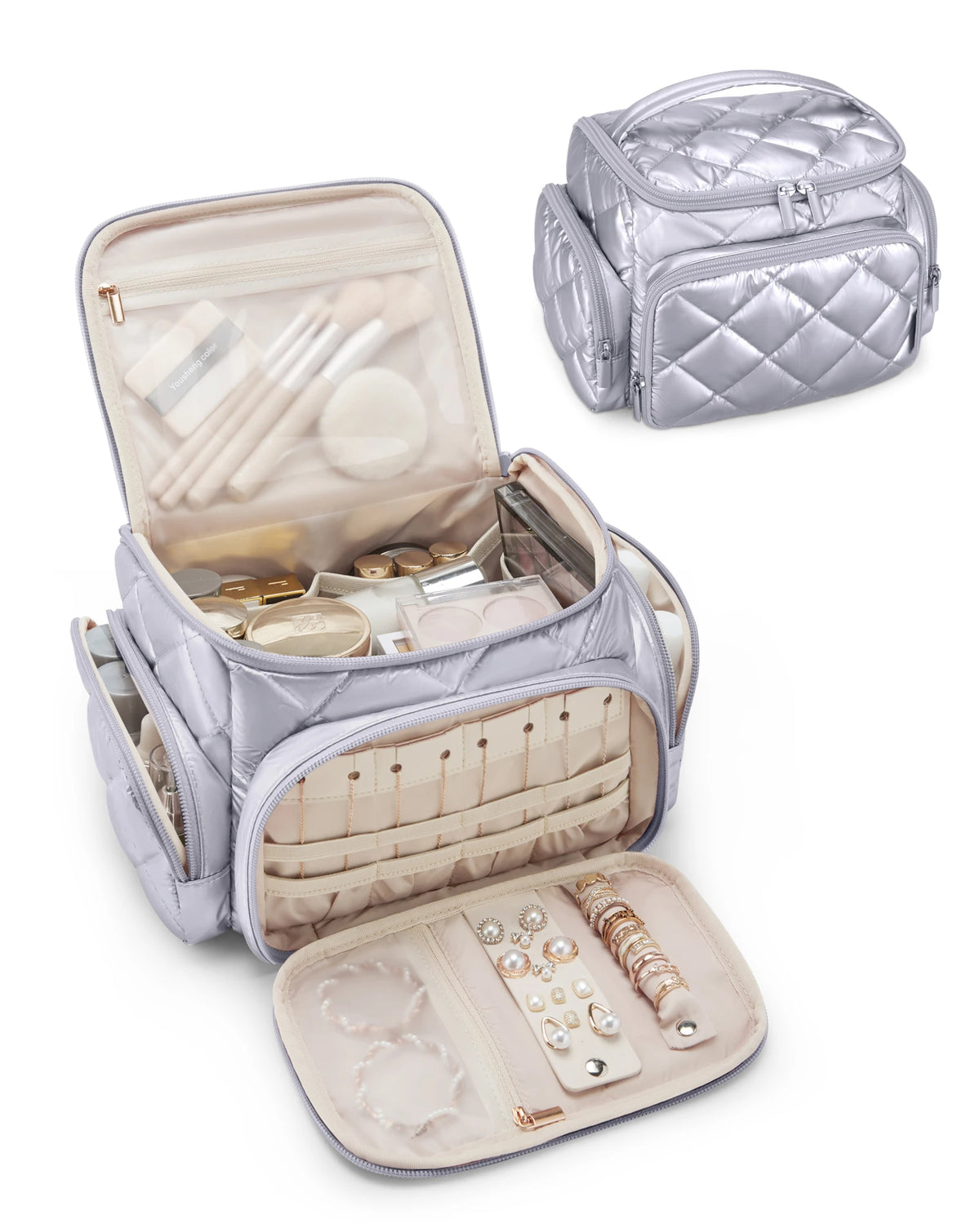 A silver quilted multi-compartment travel organizer bag with an open flap showing various cosmetic and jewelry items.