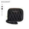Black quilted mini coin purse and card holder wallet with gold hardware