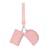 A pink compact wristlet wallet with a strap and two zippered pockets.
