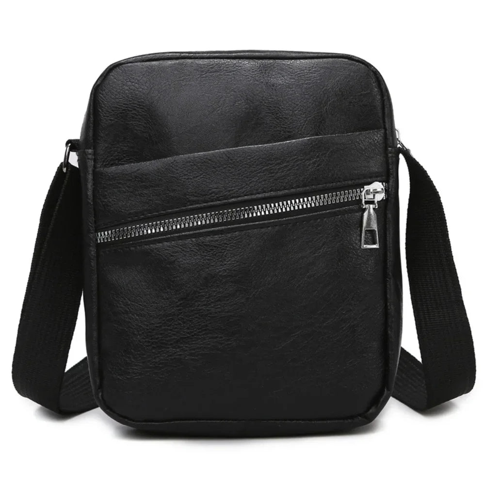 Black waterproof PU leather sling bag with a zippered pocket and adjustable strap.
