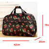 A black PU leather travel duffel bag featuring a pattern of red and green berries, shown with dimensions.